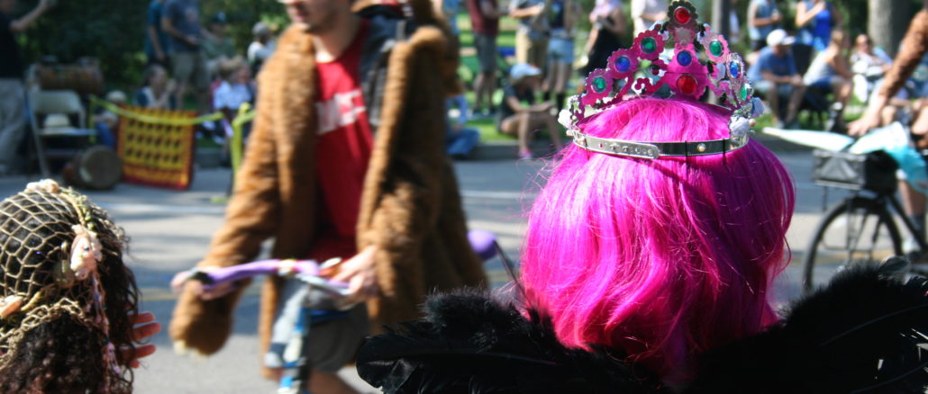 Tiaras, glitter, pink hair and feathers are common among bike riders in the Tour de Fat.