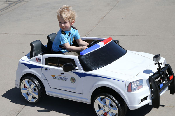 Deputy’s Son Receives Special Edition LCSO Power Wheels Car