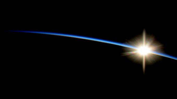 ISS, astronaut, sunrise from space