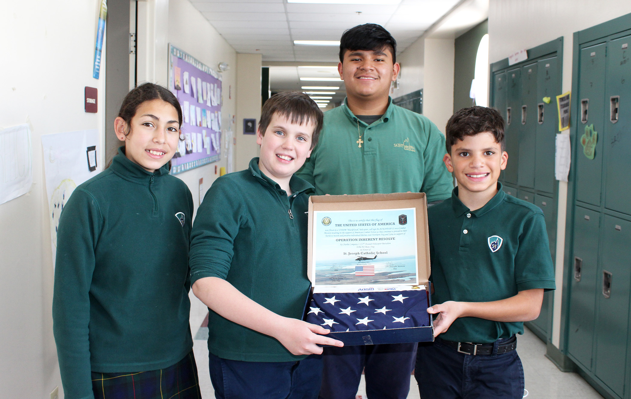 Saint Joseph Catholic School Students Receive Flag Flown in Combat