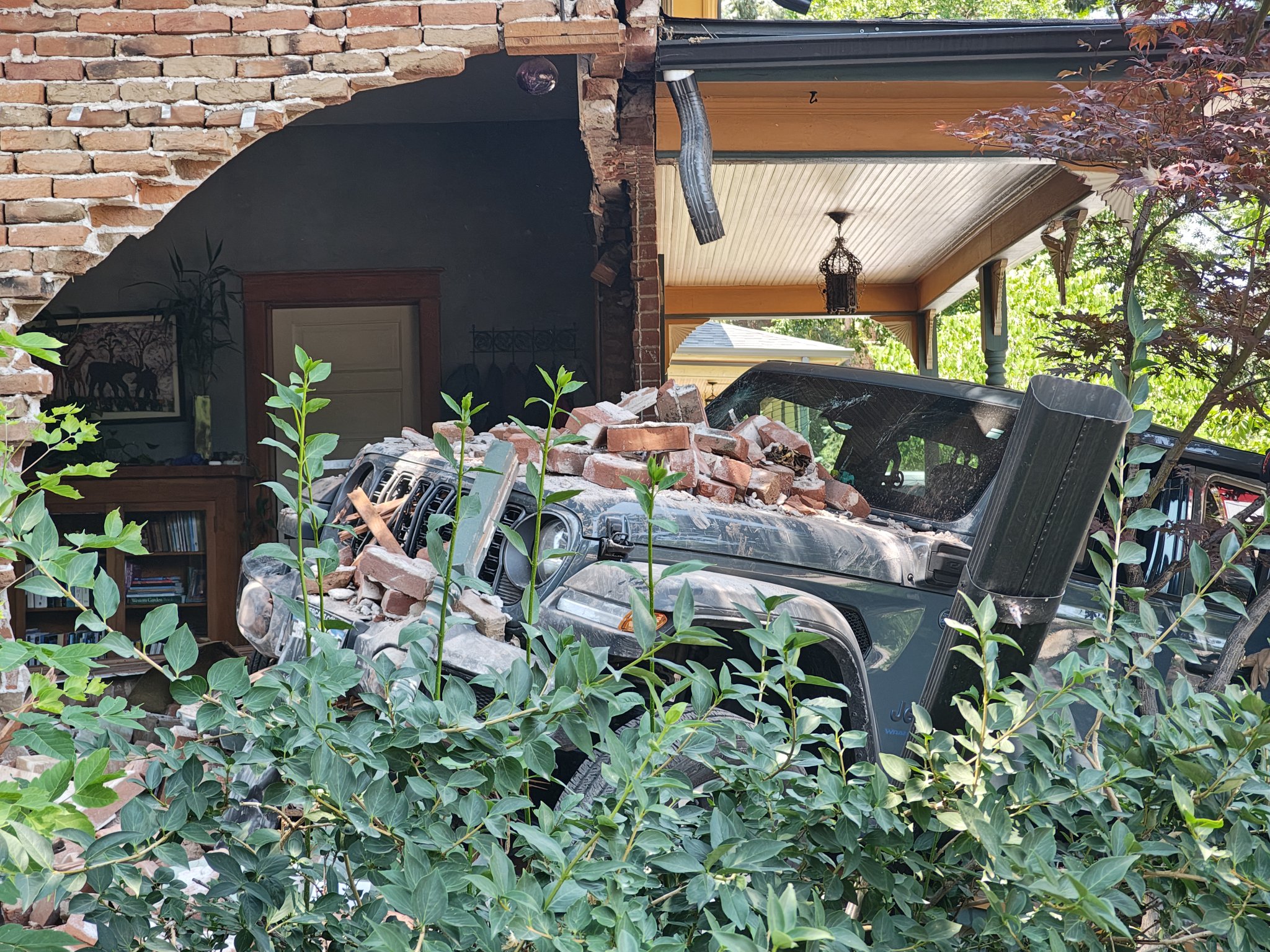 Vehicle Crashes Into Fort Collins Home; Driver Evaluated at Scene