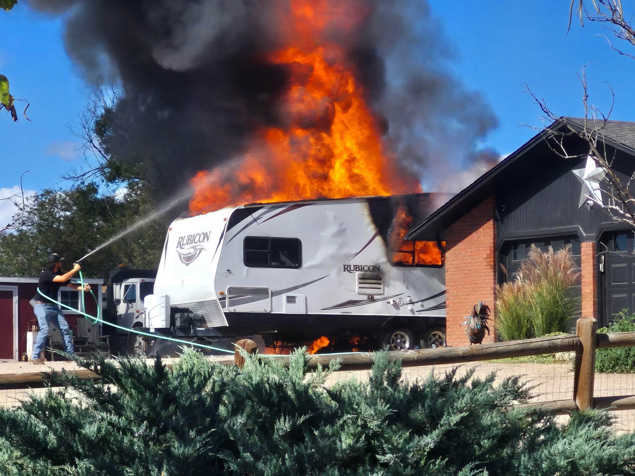 Camper Fire Threatens Home Near Johnstown